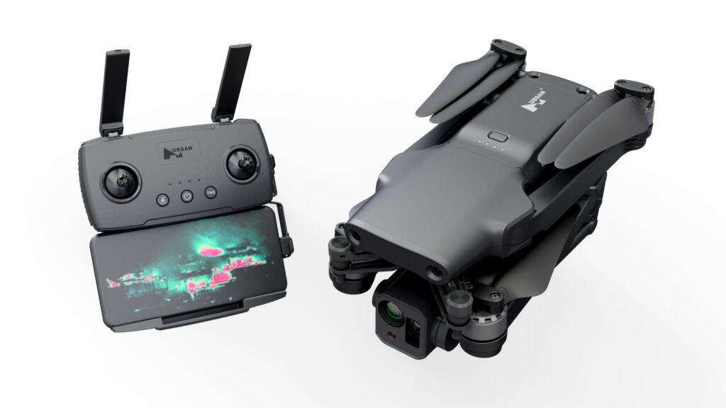 HUBSAN Firefly Drohne neben Controller mit Smartphone